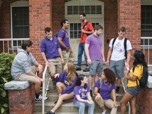 Students gathered on residence hall steps